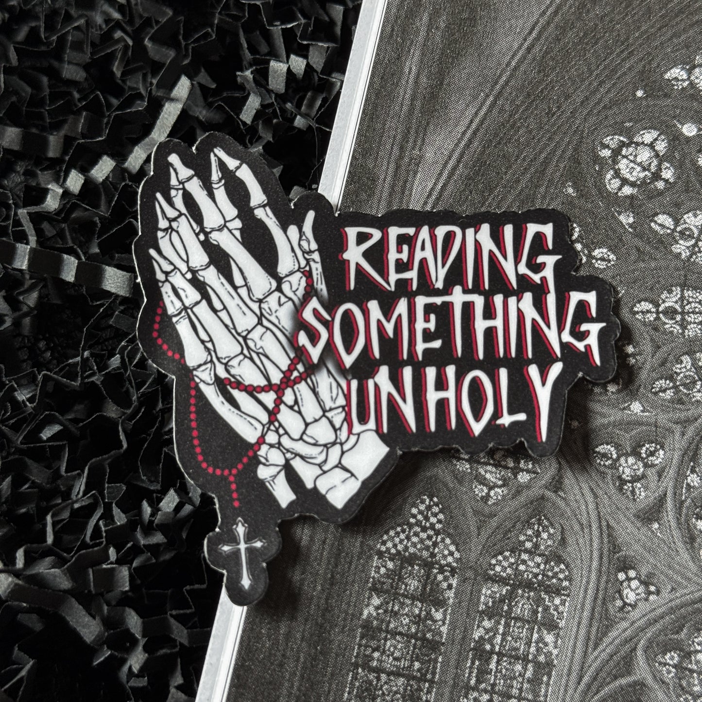 Reading Something Unholy Sticker